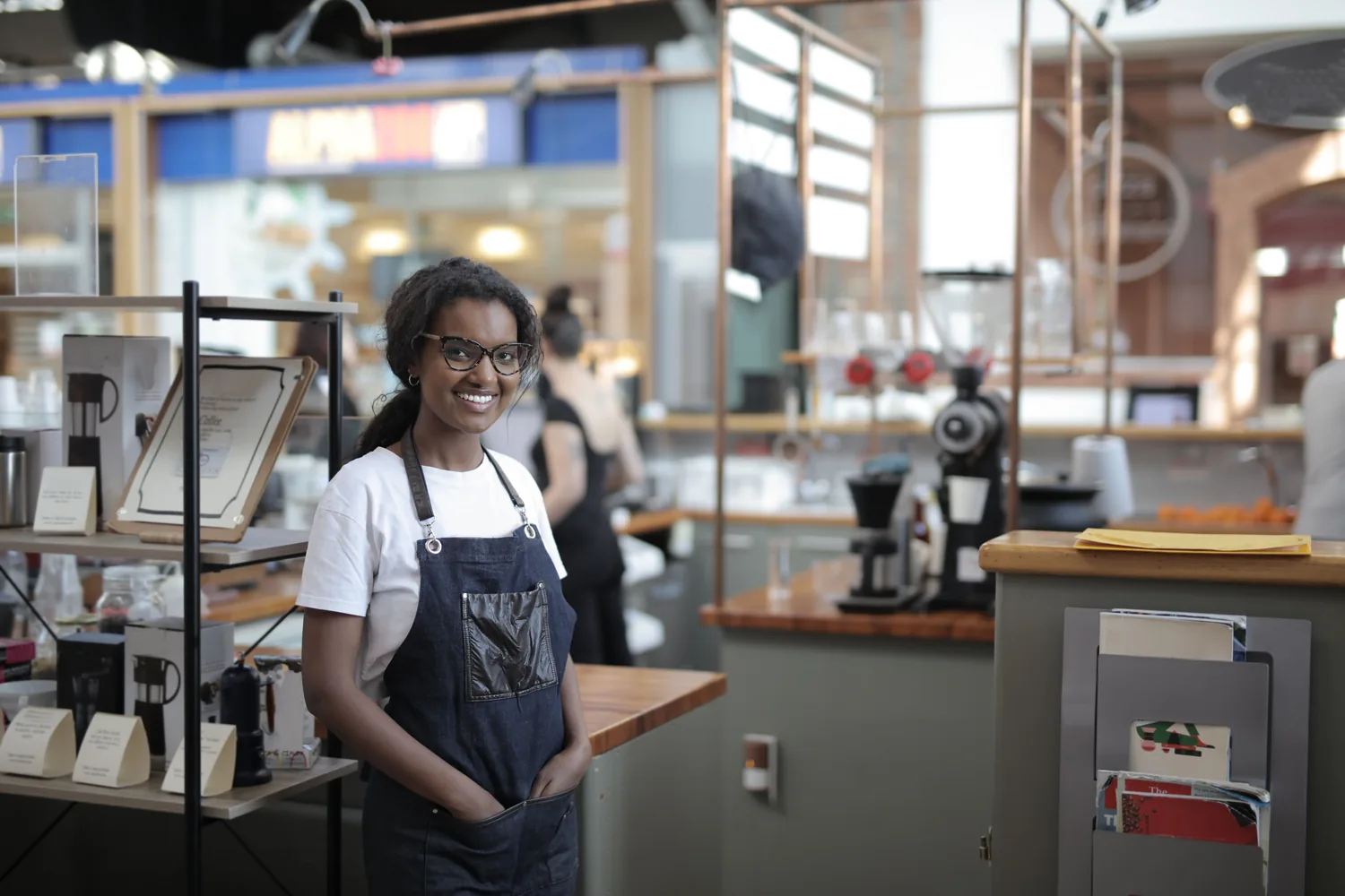 Owner behind a seafood and oyster counter